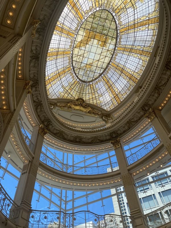 A stained-glass dome seen from below